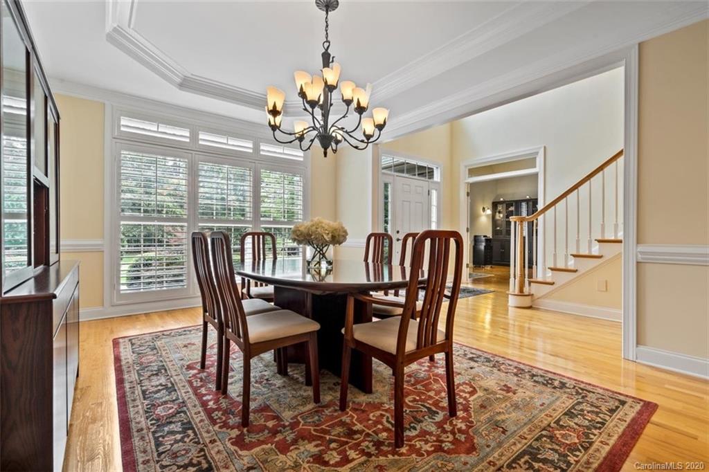 142 Spring Branch Road Fort Mill, SC 29715 - Photo 4 of 48 a view of a dining room with furniture window and wooden floor