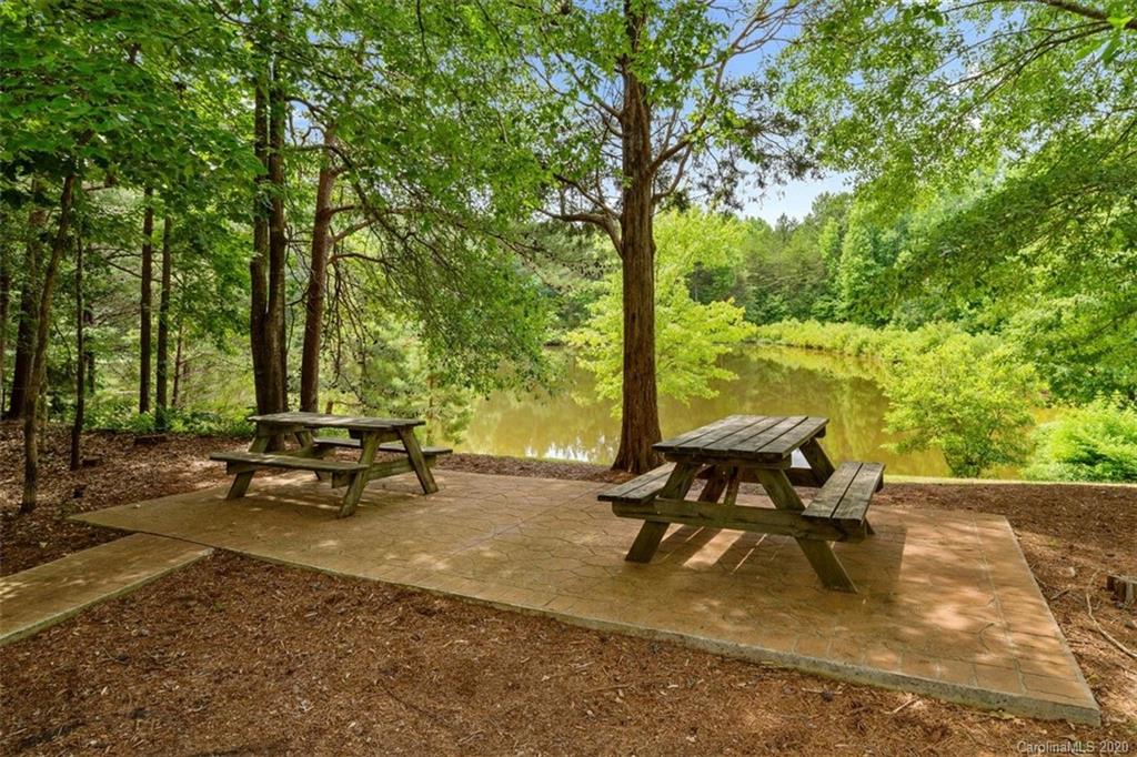 142 Spring Branch Road Fort Mill, SC 29715 - Photo 41 of 48 a view of a lake with outdoor seating