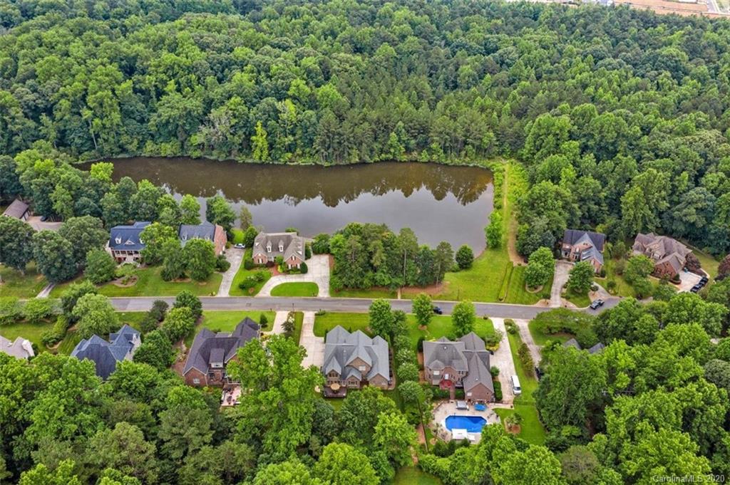 142 Spring Branch Road Fort Mill, SC 29715 - Photo 45 of 48 a view of a lake with a yard