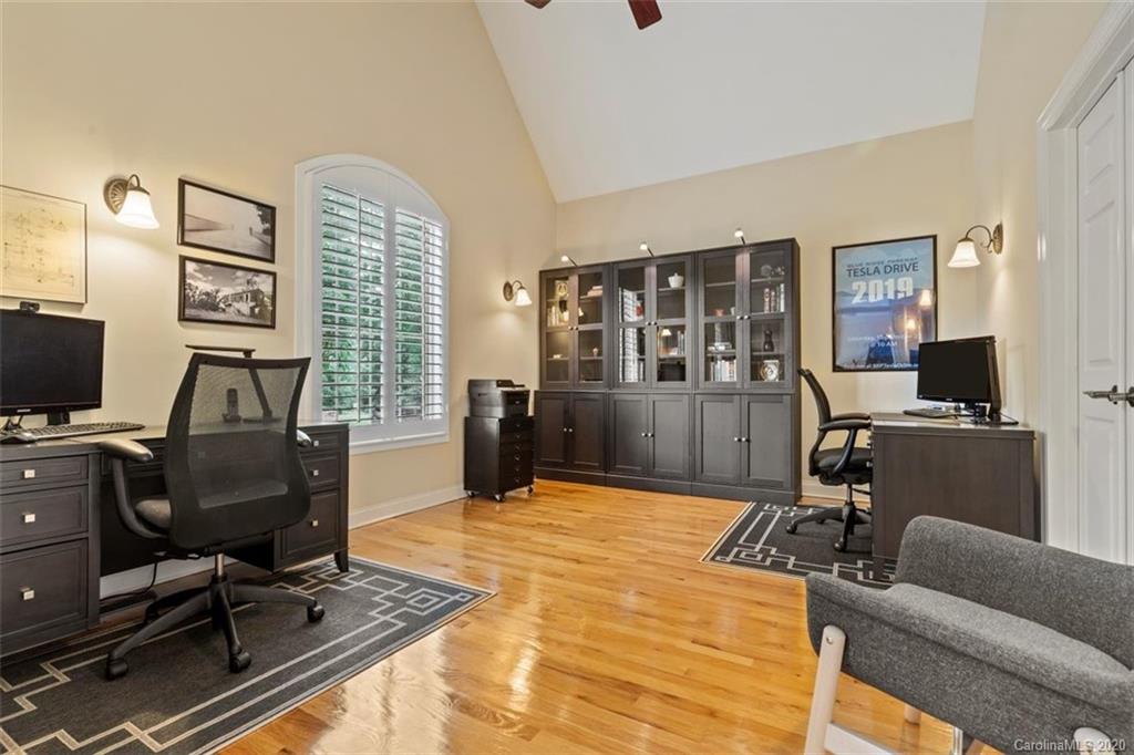 142 Spring Branch Road Fort Mill, SC 29715 - Photo 7 of 48 a view of a livingroom with workspace and a couch