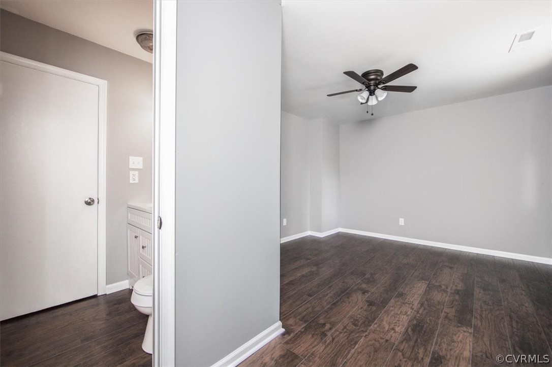 9301 Telstar Drive Richmond, VA 23237 - Photo 19 of 24 a view of a hallway with wooden floor