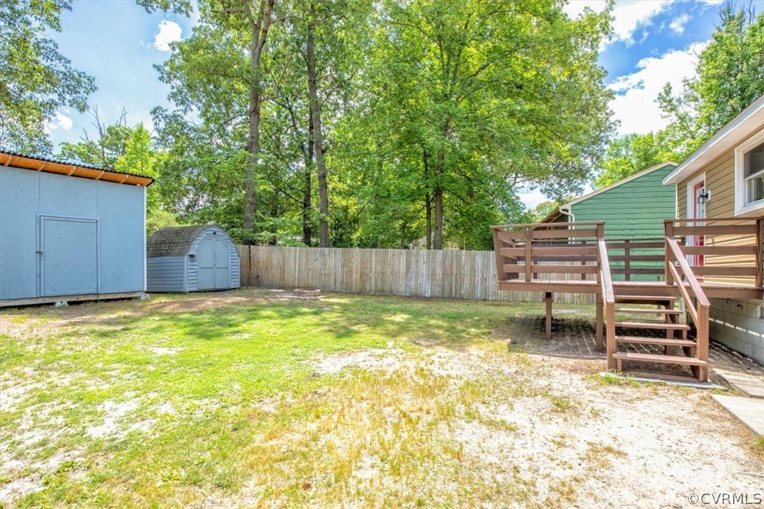 9301 Telstar Drive Richmond, VA 23237 - Photo 24 of 24 a backyard of a house
