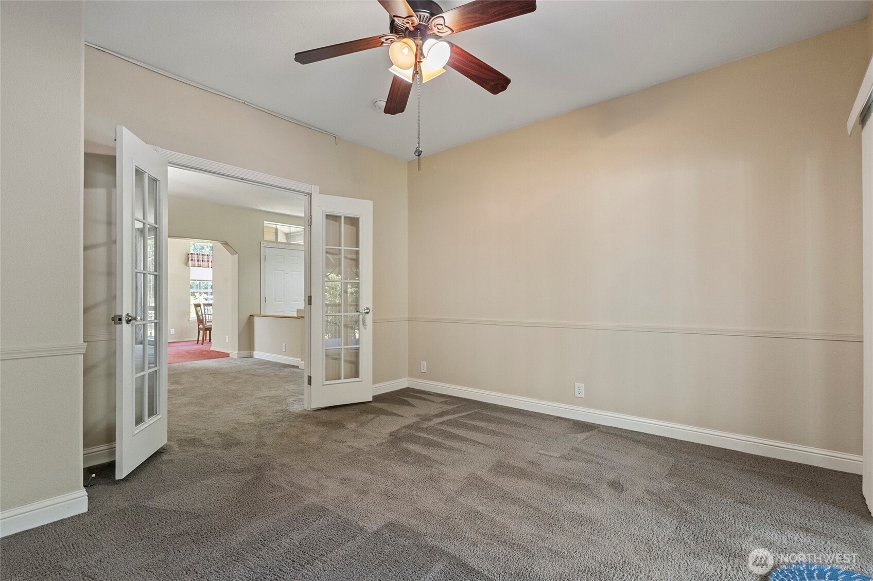 6948 Howell Lane Sedro-Woolley, WA 98284 - Photo 16 of 40 an empty room with closet and a chandelier fan
