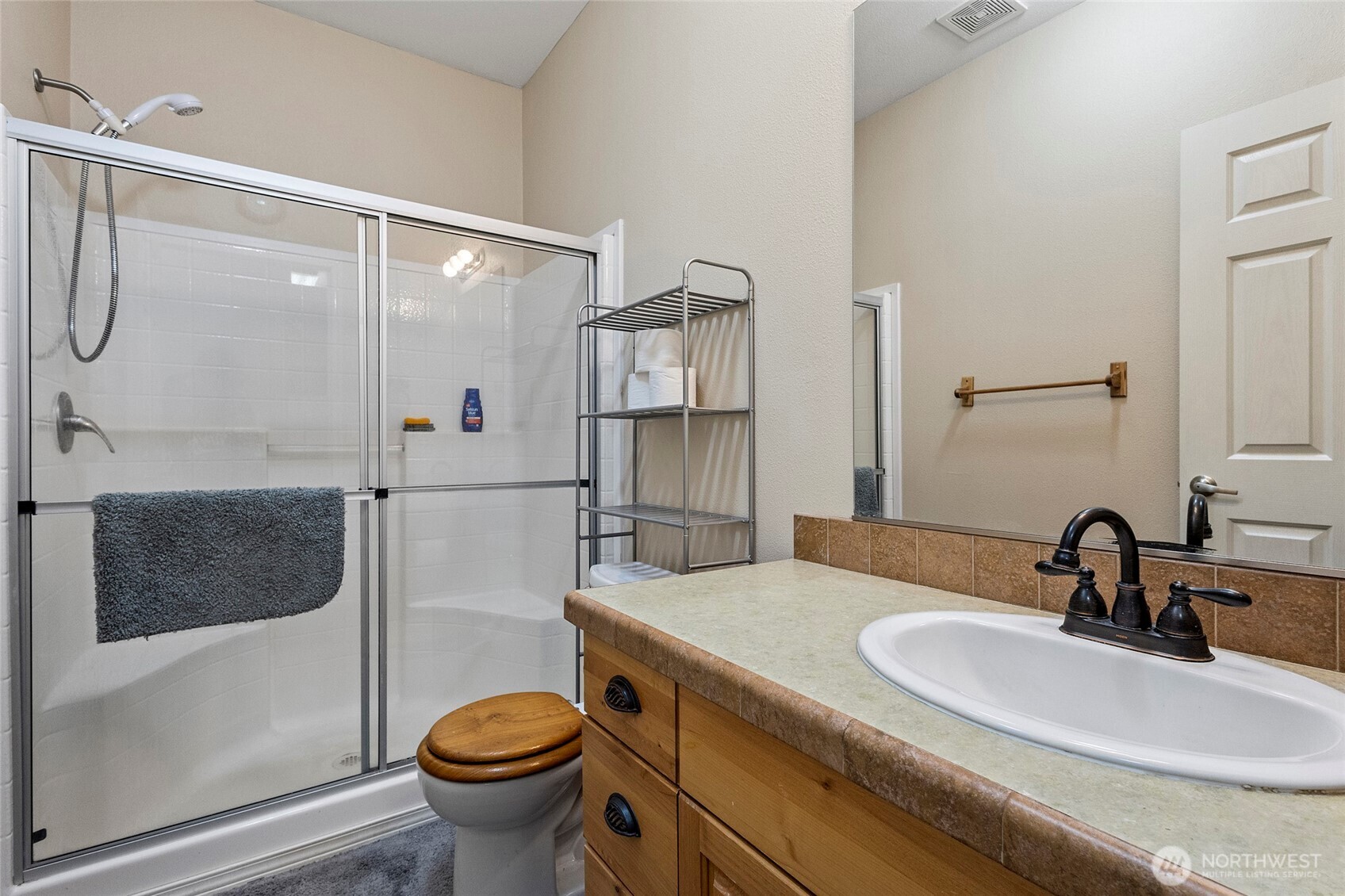 6948 Howell Lane Sedro-Woolley, WA 98284 - Photo 20 of 40 a bathroom with a sink toilet and shower