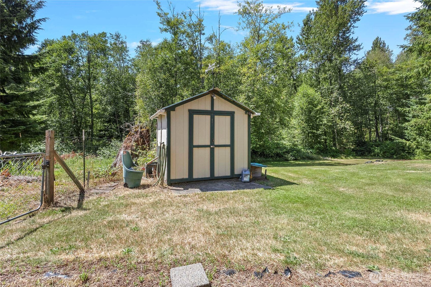 6948 Howell Lane Sedro-Woolley, WA 98284 - Photo 27 of 40 a front view of a house with a yard