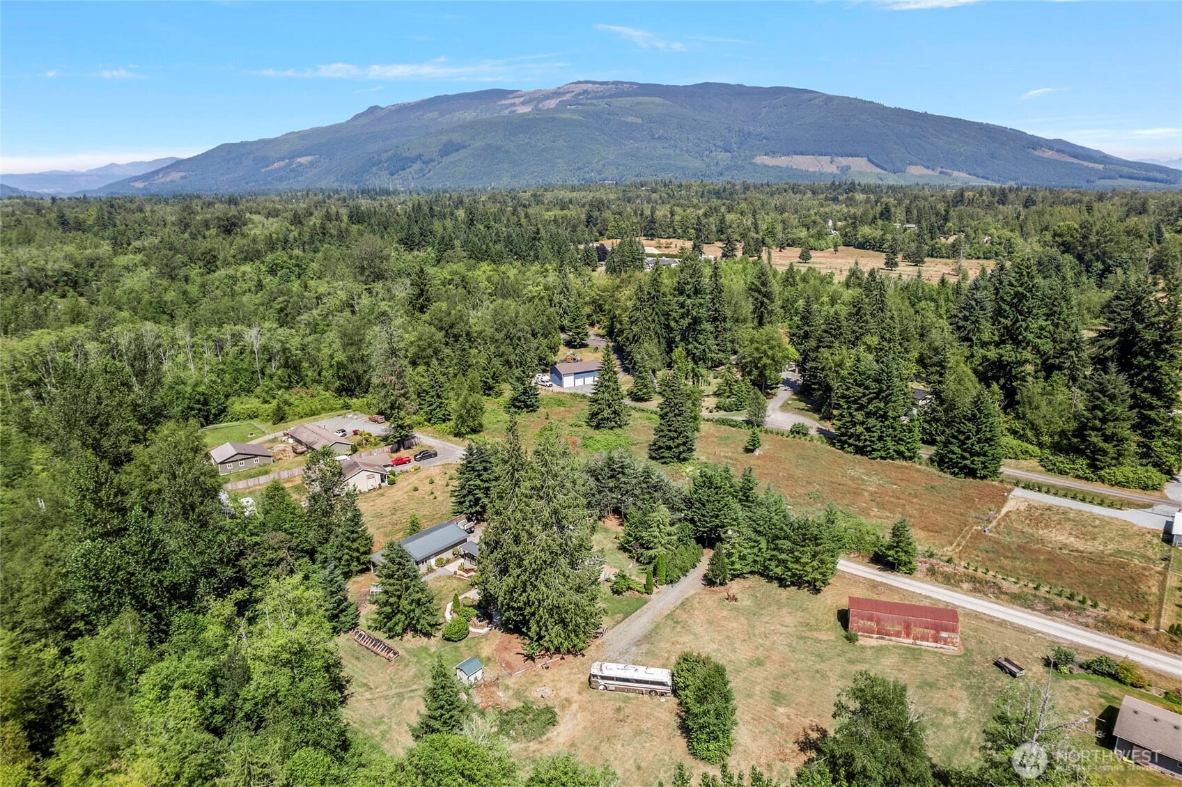 6948 Howell Lane Sedro-Woolley, WA 98284 - Photo 38 of 40 a view of a lush green hillside and houses