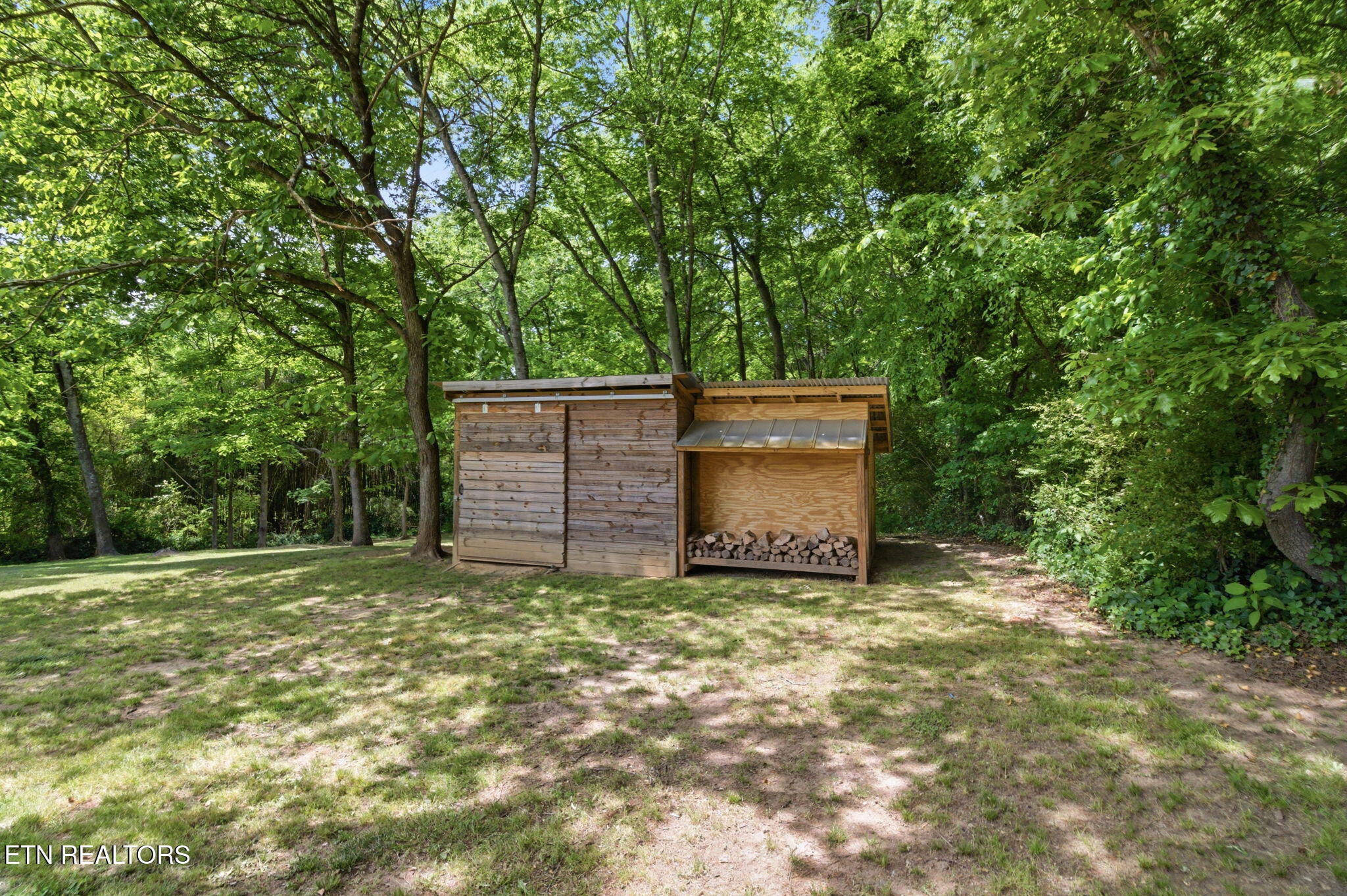 2540 Mentor Road Louisville, TN 37777 - Photo 24 of 30 Custom Storage Shed with Firewood Holder