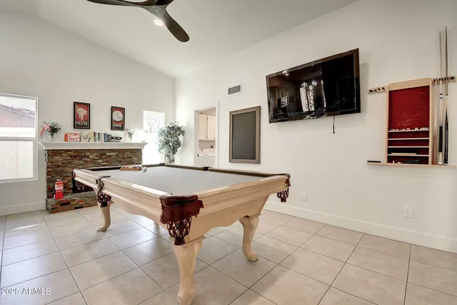 a kitchen with stainless steel appliances a stove sink microwave and refrigerator