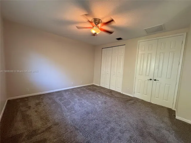 a bathroom with a bathtub sink and mirror