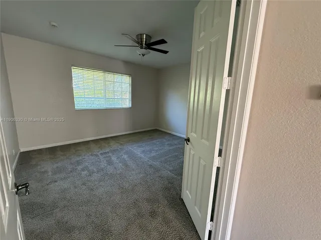 a view of a bathroom with a toilet