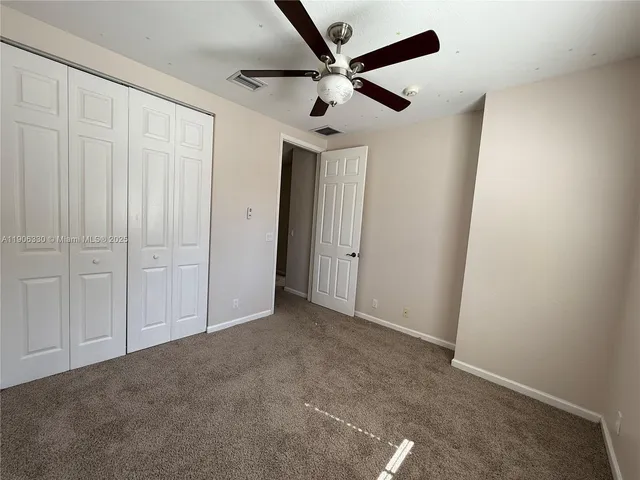 a view of a lake and a yard