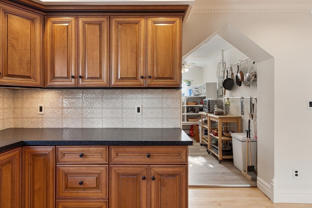 303 Nahant Road Nahant, MA 01908 - Photo 19 of 41 a kitchen with stainless steel appliances granite countertop a refrigerator and cabinets