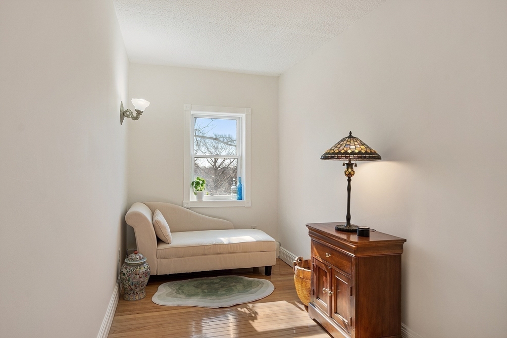303 Nahant Road Nahant, MA 01908 - Photo 23 of 41 a living room with furniture and a window