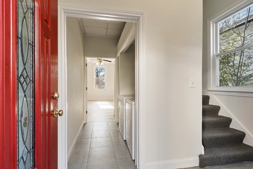 303 Nahant Road Nahant, MA 01908 - Photo 26 of 41 a view of a hallway with windows and stairs