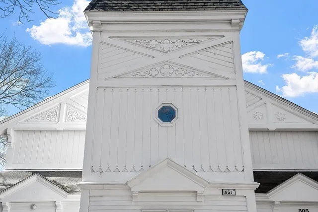 a kitchen with a refrigerator and a stove
