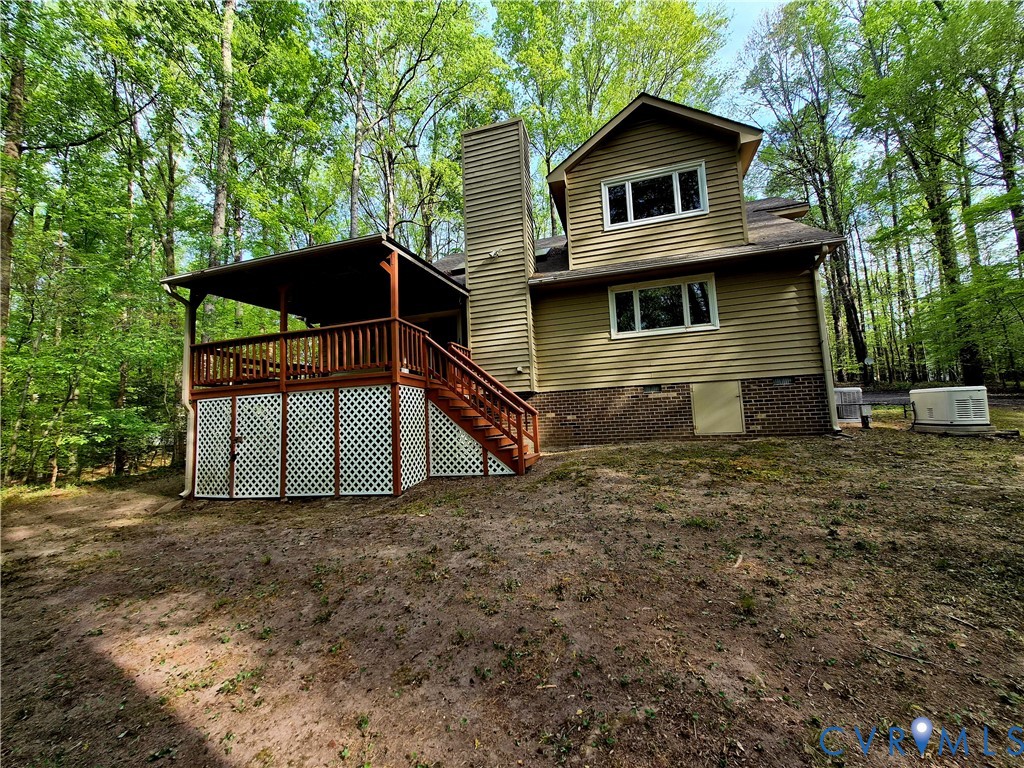 4099 Doe Run Road Hopewell, VA 23860 - Photo 8 of 35 a front view of a house with a yard