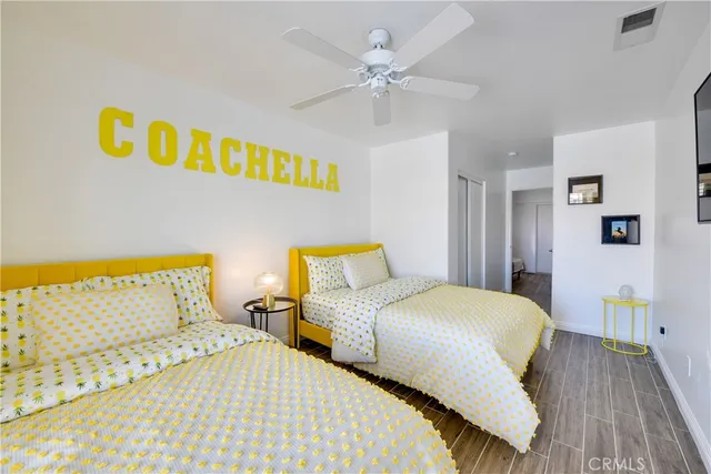 a bedroom with a bed and a table