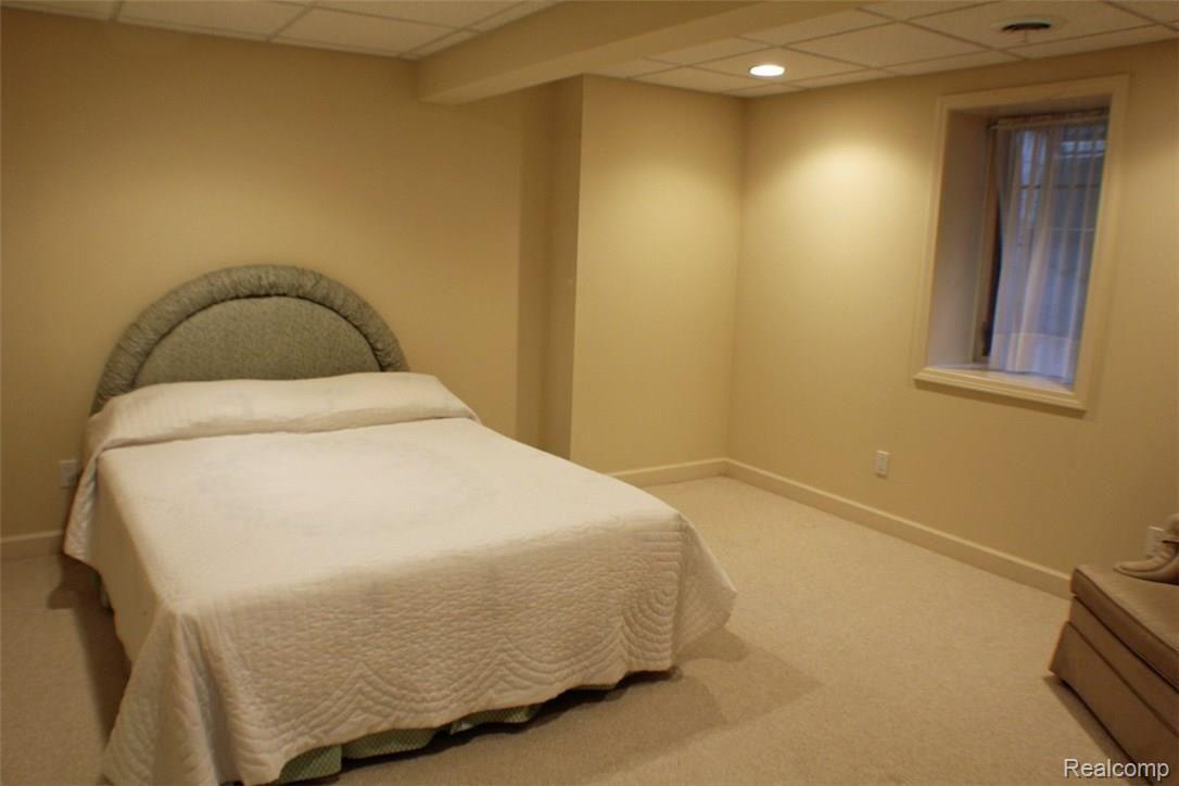 5081 Belmonte Drive, Unit 59 Rochester, MI 48306 - Photo 16 of 22 Lower Level Bedroom.jpg