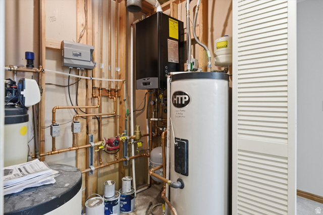 45 West 100 South Mendon, UT 84325 - Photo 36 of 64 Utility room with water heater and tankless water heater