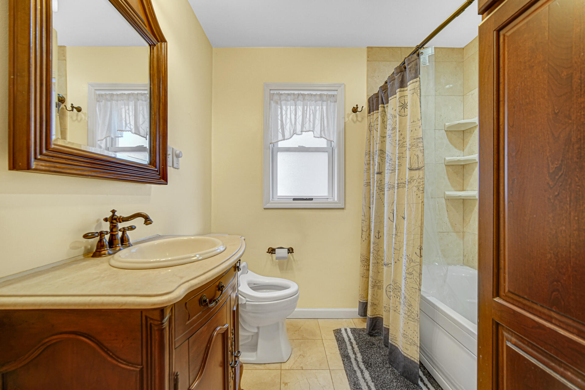 131 Shore Drive Portage, IN 46368 - Photo 13 of 30 a bathroom with a sink a toilet and shower