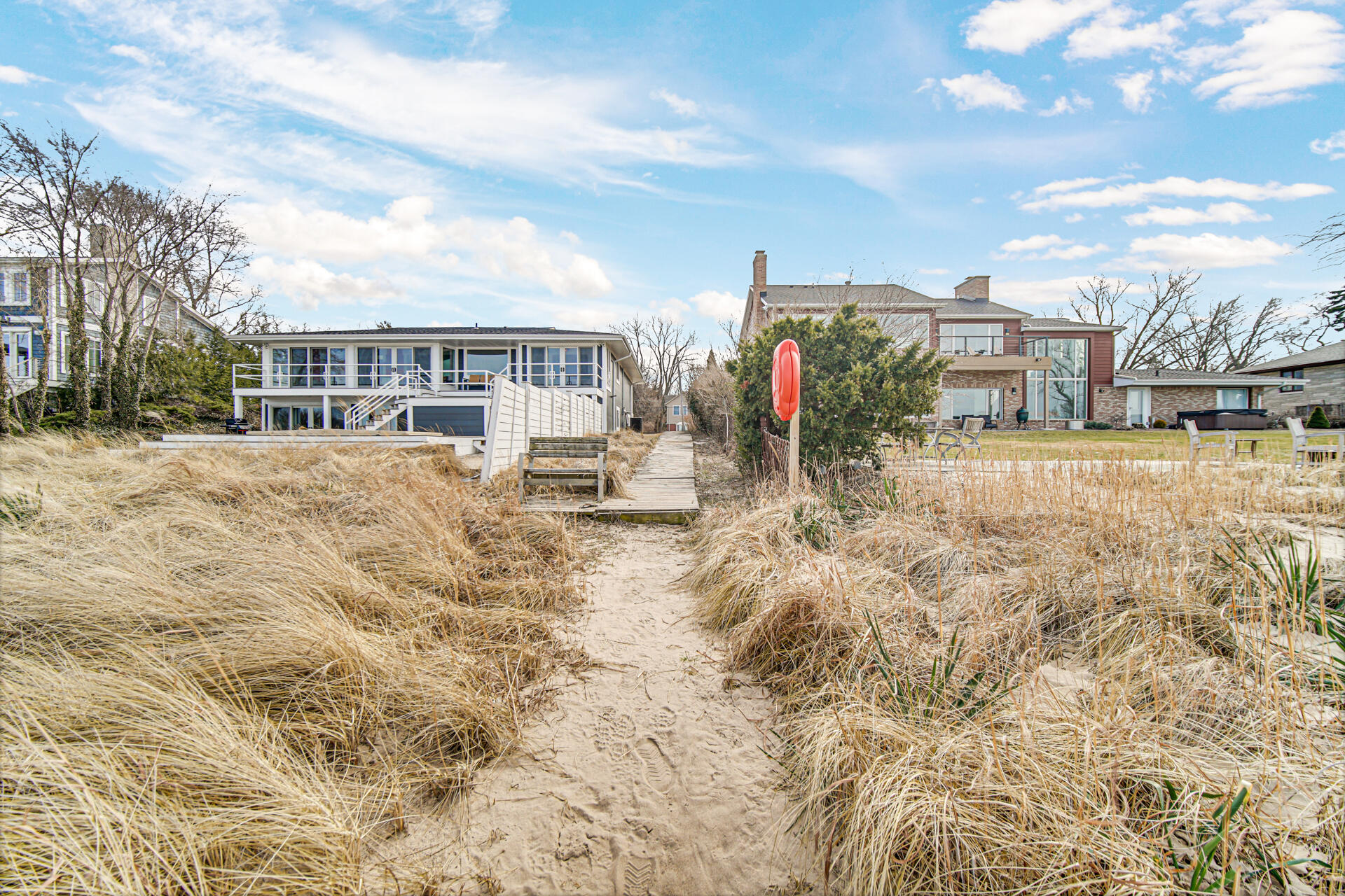 131 Shore Drive Portage, IN 46368 - Photo 4 of 30 a view of residential houses with yard and ocean view