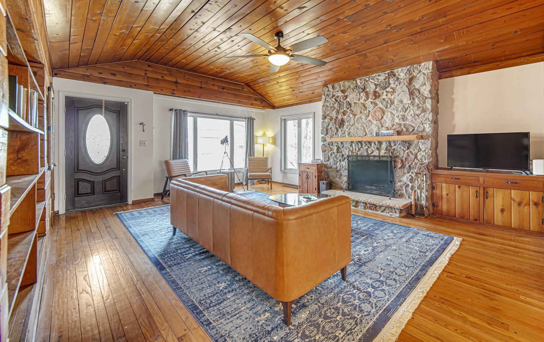 131 Shore Drive Portage, IN 46368 - Photo 6 of 30 a living room with furniture and a fireplace