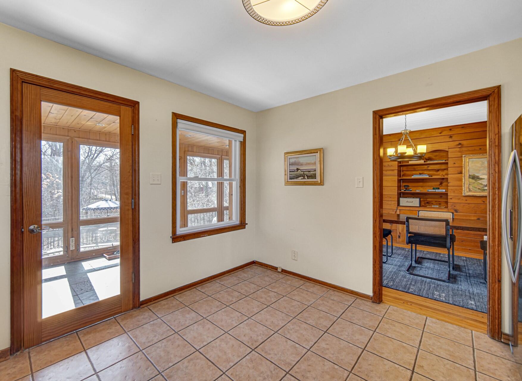131 Shore Drive Portage, IN 46368 - Photo 10 of 30 a view of empty room with window and fireplace