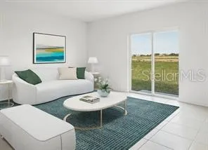 a living room with furniture and a window