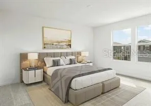 a bedroom with bed and a large window