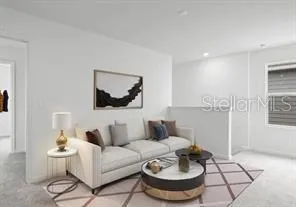 a living room with furniture and a table