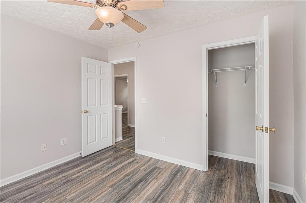 1576 Thornwick Trace Stockbridge, GA 30281 - Photo 28 of 30 wooden floor in an empty room with a window