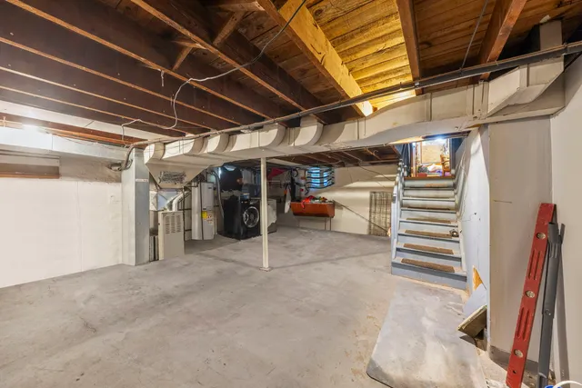 a view of empty room with stairs