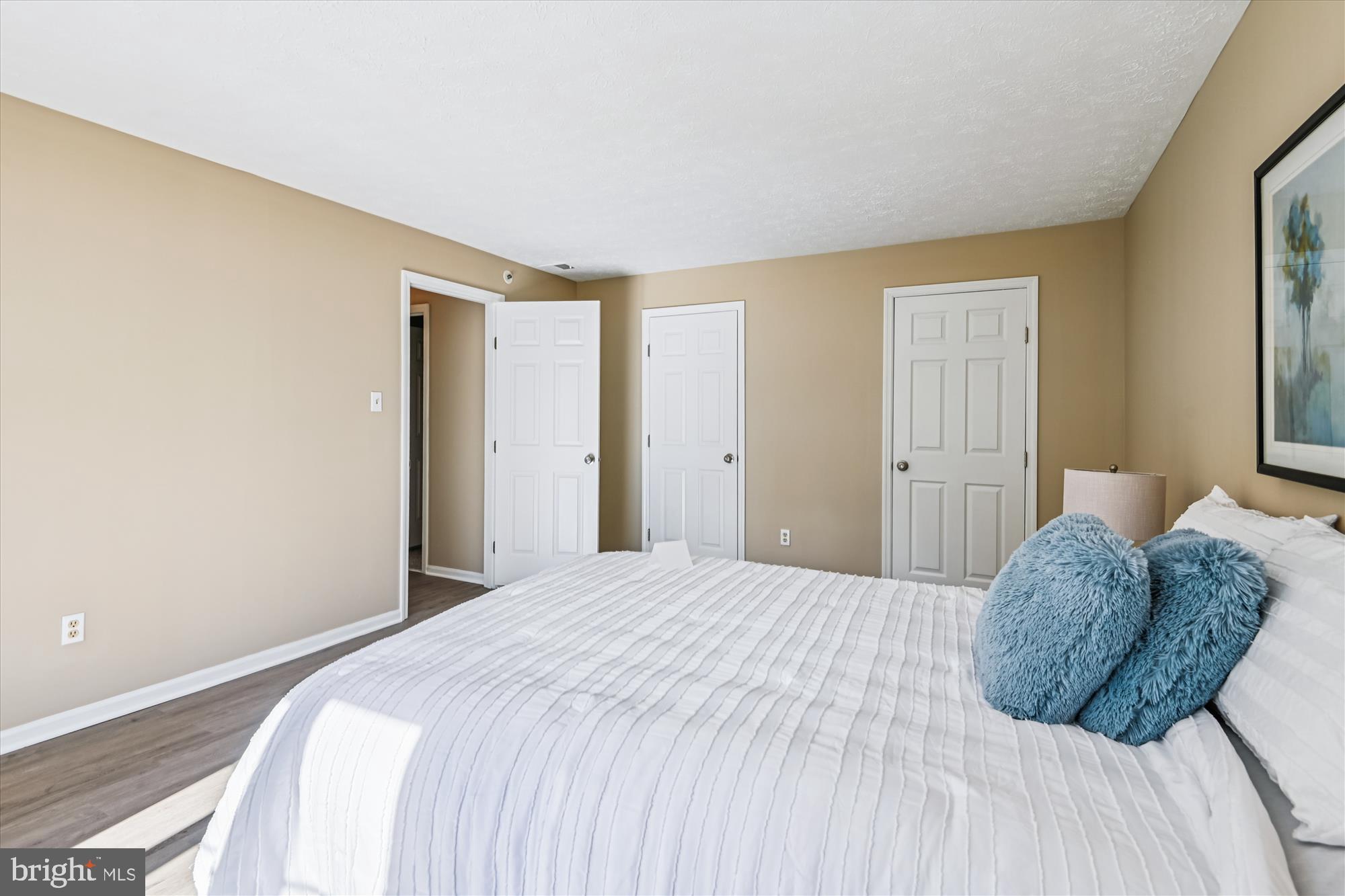 717 Deering Road, Unit 5L Pasadena, MD 21122 - Photo 15 of 29 a bedroom with a bed and a window