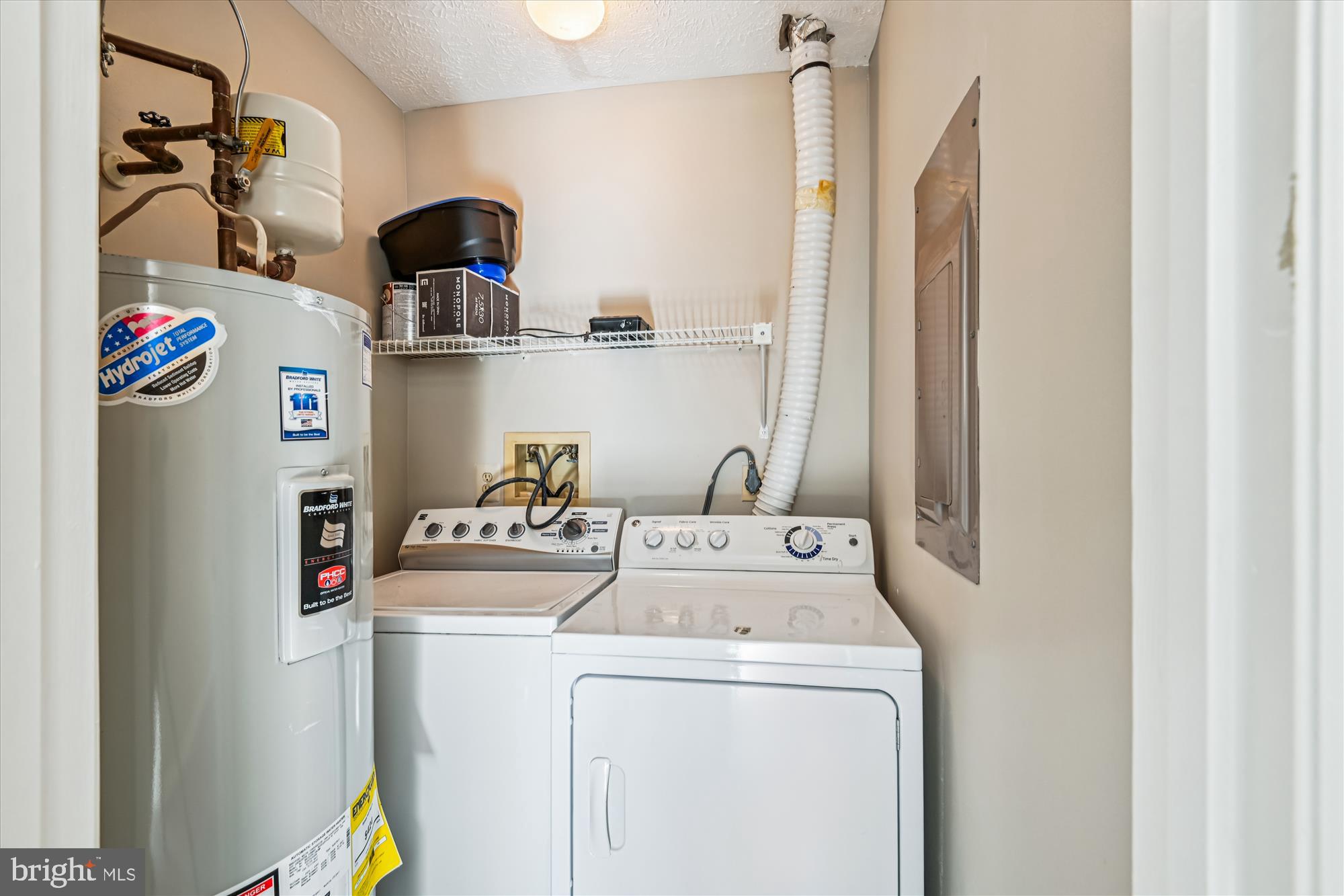 717 Deering Road, Unit 5L Pasadena, MD 21122 - Photo 21 of 29 a utility room with dryer and washer