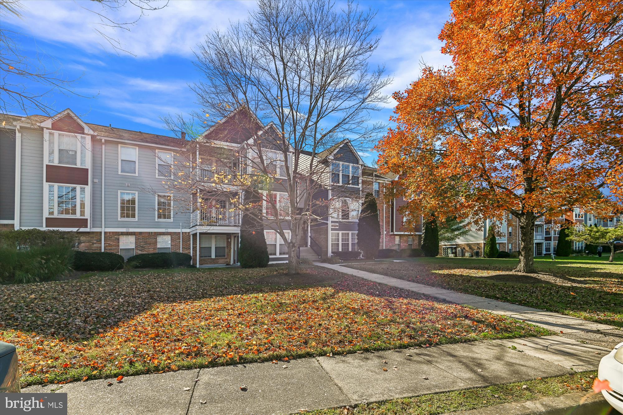 717 Deering Road, Unit 5L Pasadena, MD 21122 - Photo 27 of 29 a view of a building with a yard