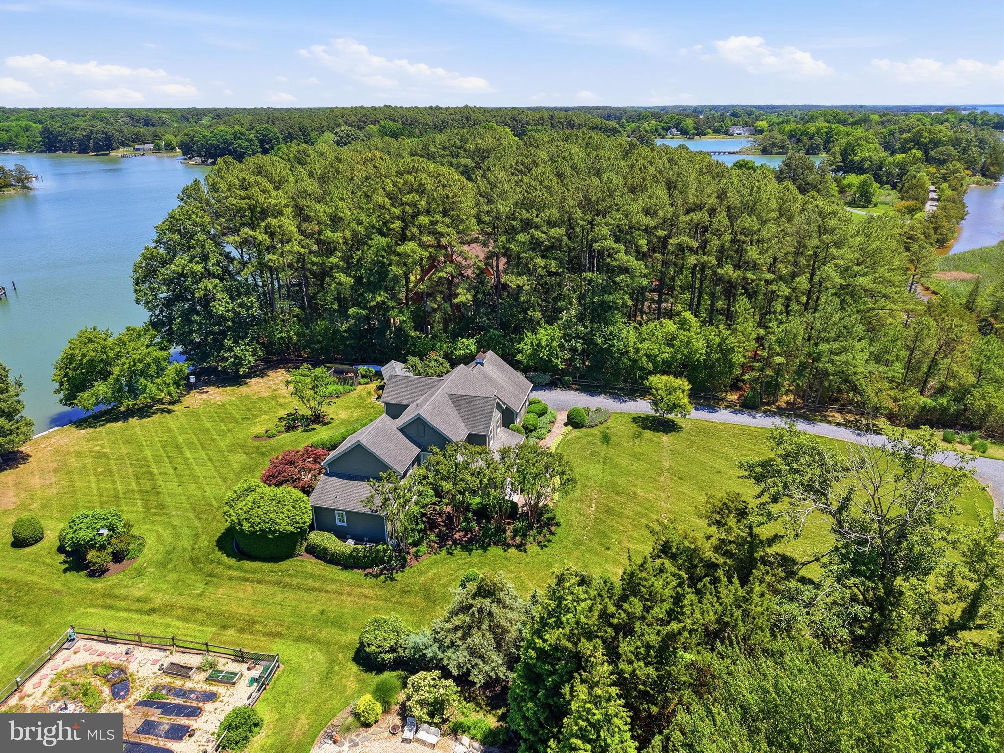 26226 Langs Landing Road Oxford, MD 21654 - Photo 47 of 48 an aerial view of a house with a yard