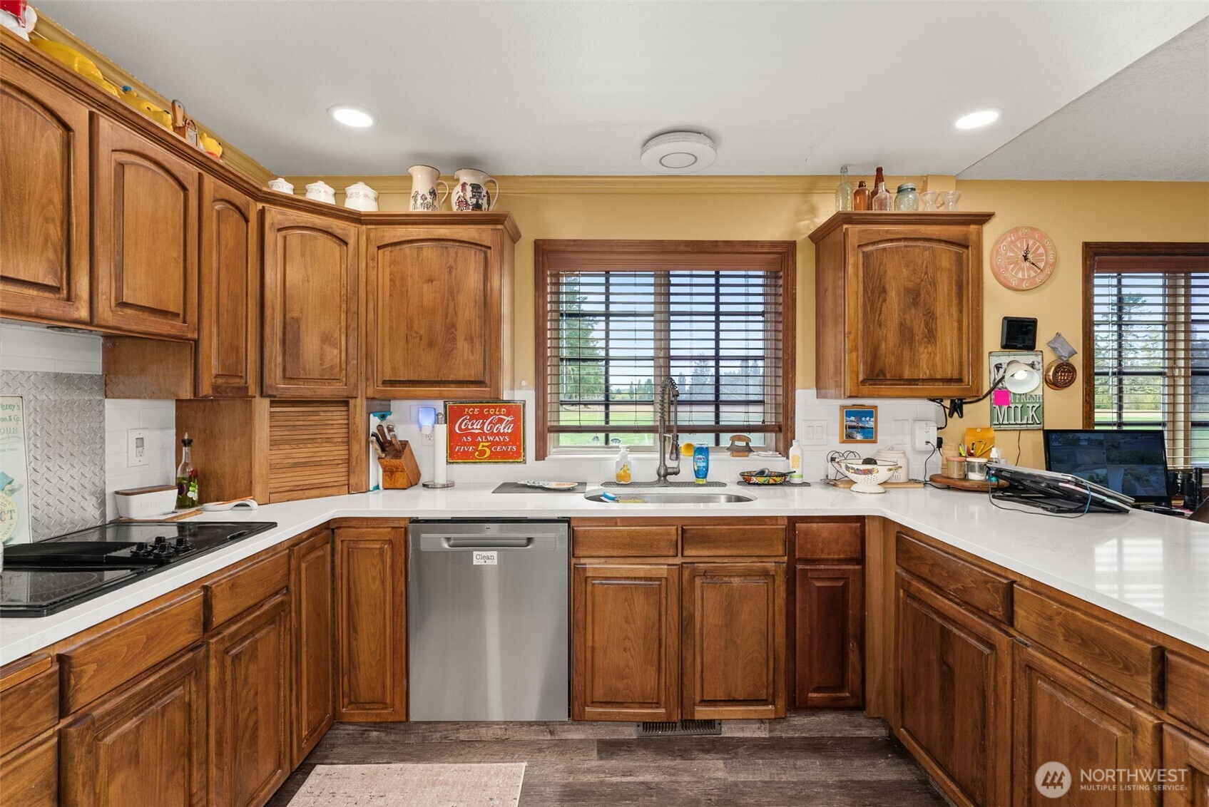 112 Village Way Drive Chehalis, WA 98532 - Photo 15 of 40 a kitchen with a sink stove top oven and cabinets