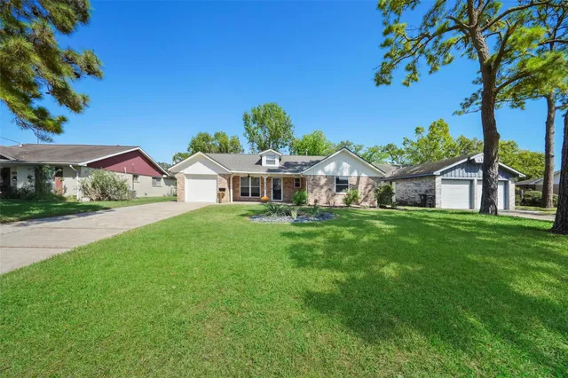 a view of house with garden
