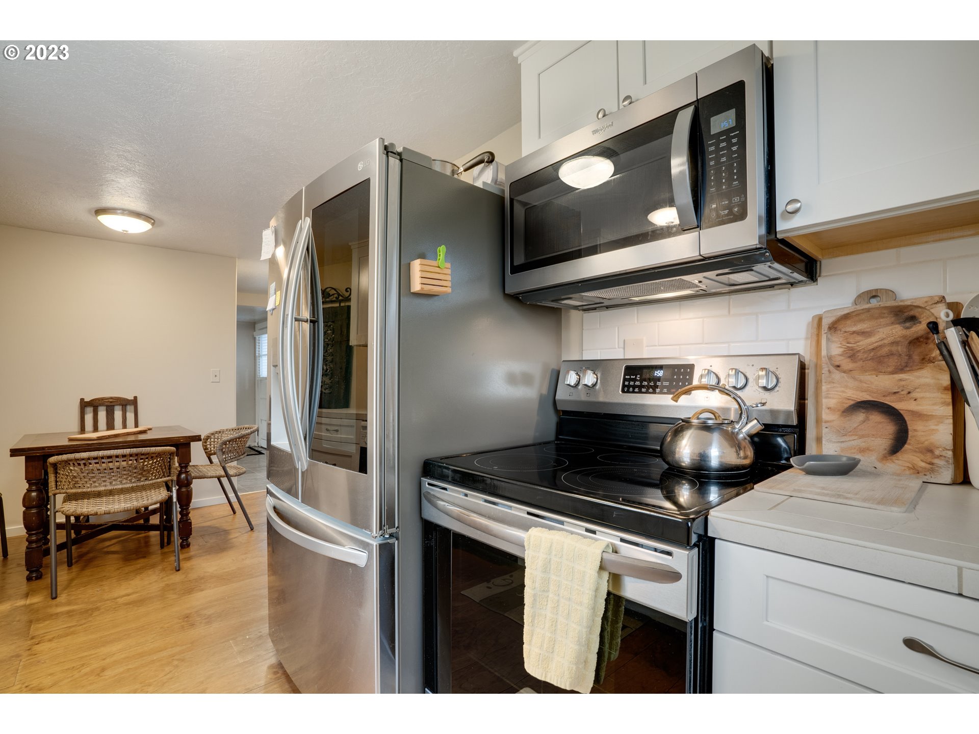 360 Southeast Edwards Drive Dundee, OR 97115 - Photo 13 of 31 a kitchen with a stove and a microwave