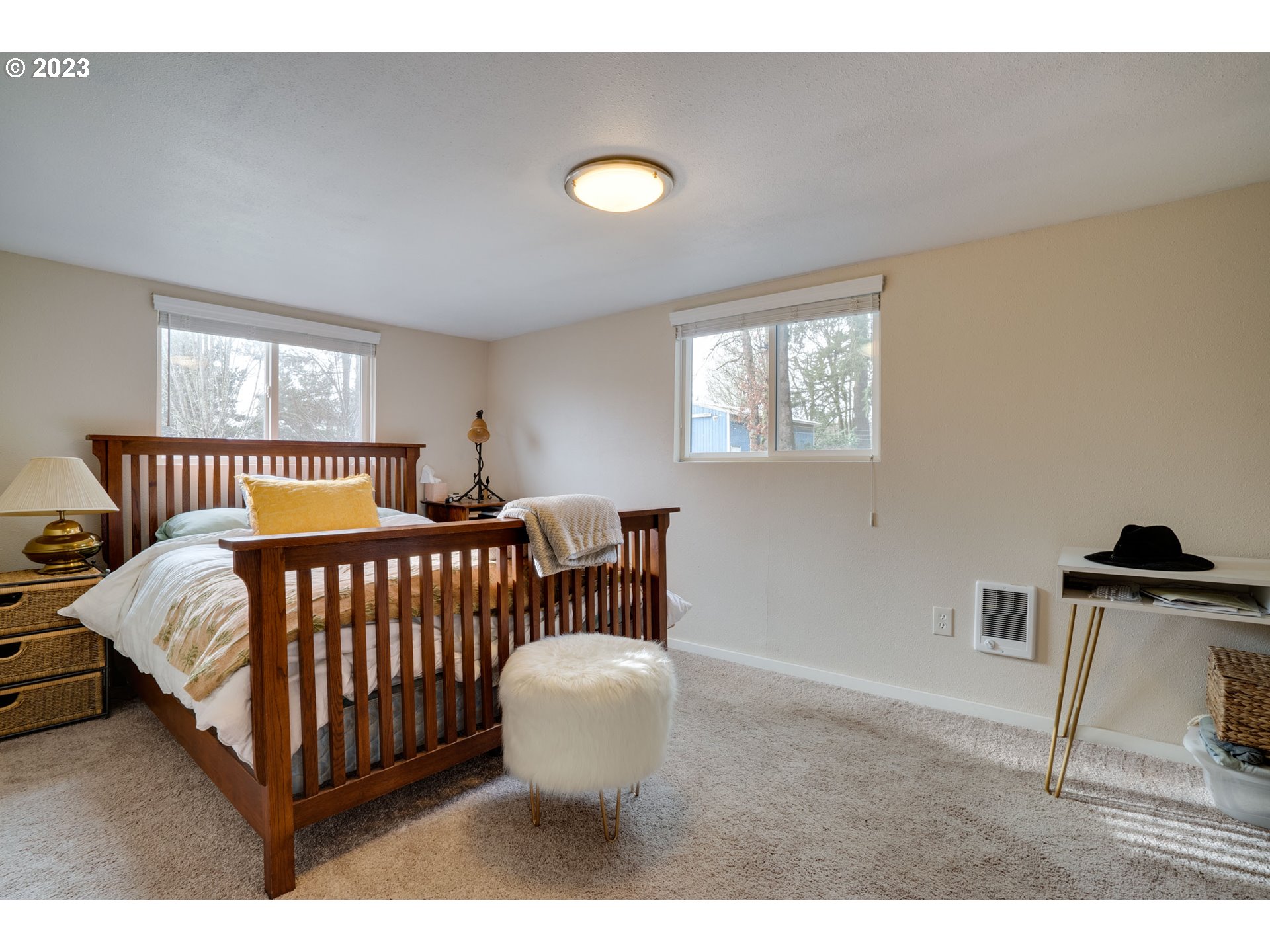 360 Southeast Edwards Drive Dundee, OR 97115 - Photo 18 of 31 a bedroom with a bed and window