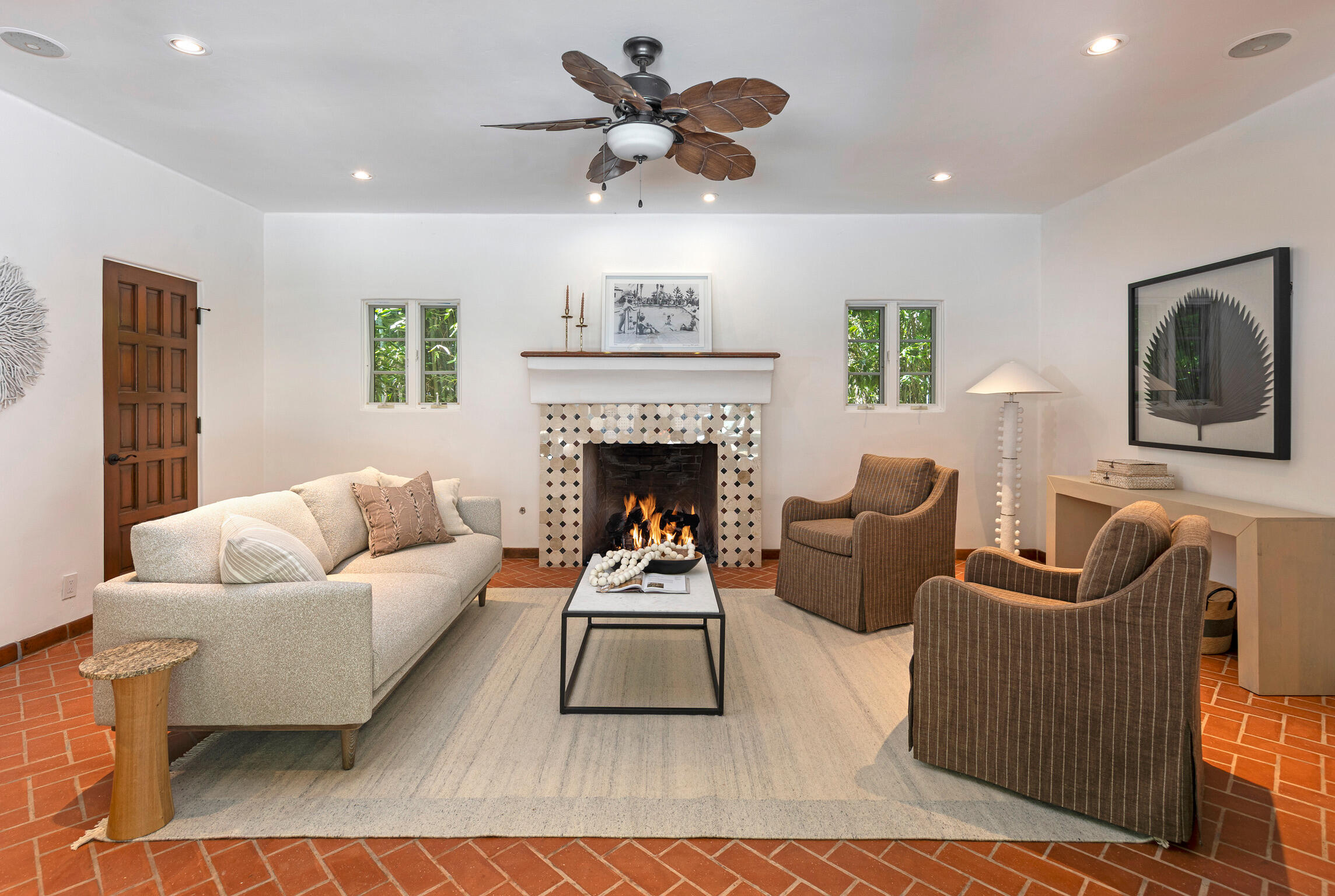 1493 Sycamore Canyon Road Montecito, CA 93108 - Photo 33 of 47 a living room with furniture and a fireplace