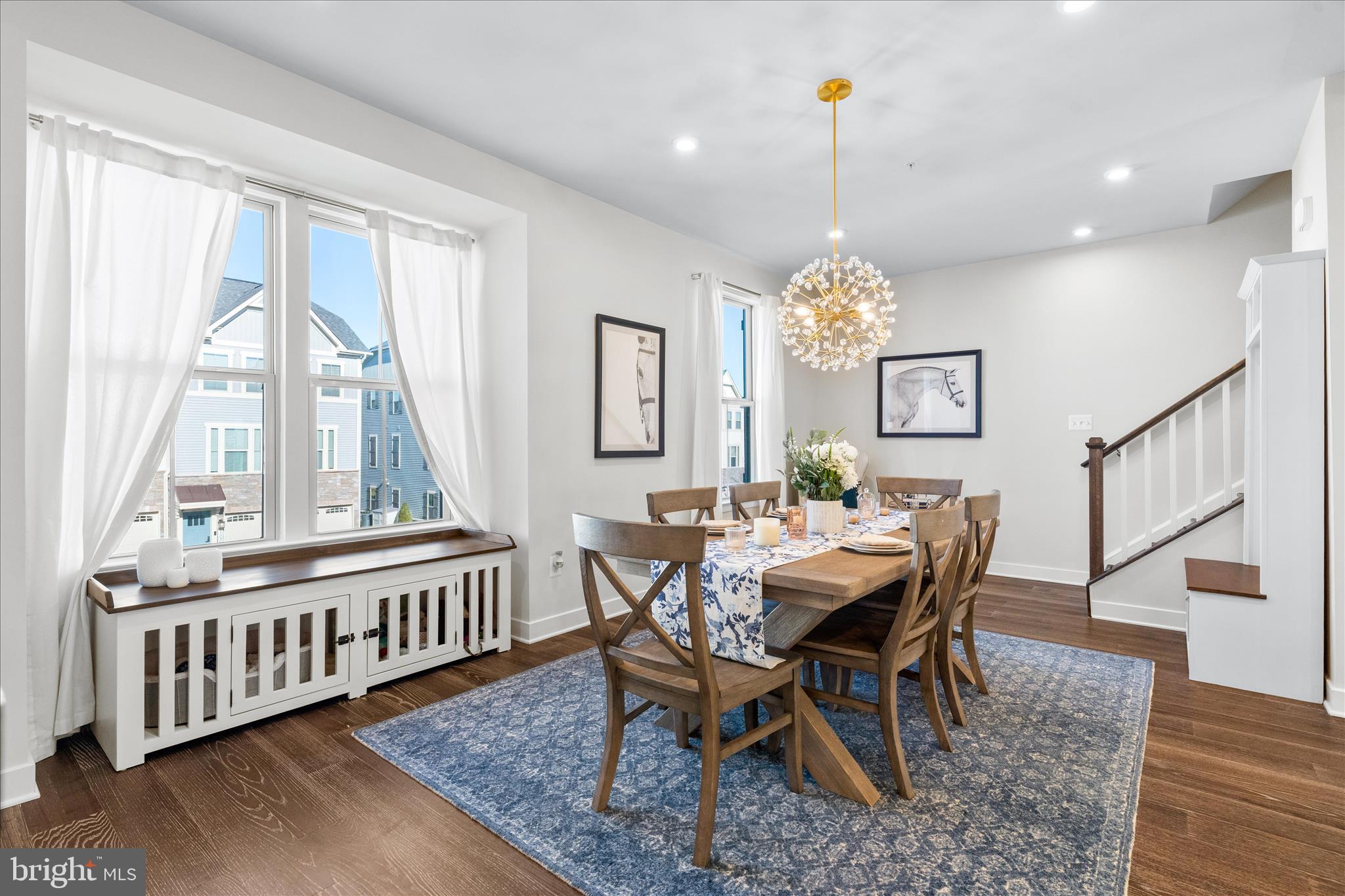 10327 Quillback Street New Market, MD 21774 - Photo 16 of 50 a view of a dining room with furniture window and wooden floor