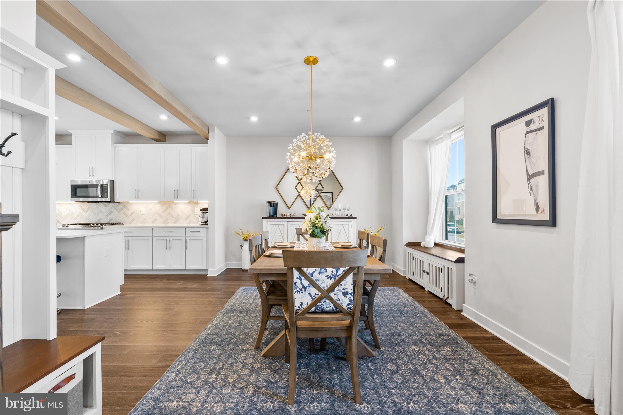 10327 Quillback Street New Market, MD 21774 - Photo 17 of 50 a view of a dining room with furniture window and wooden floor