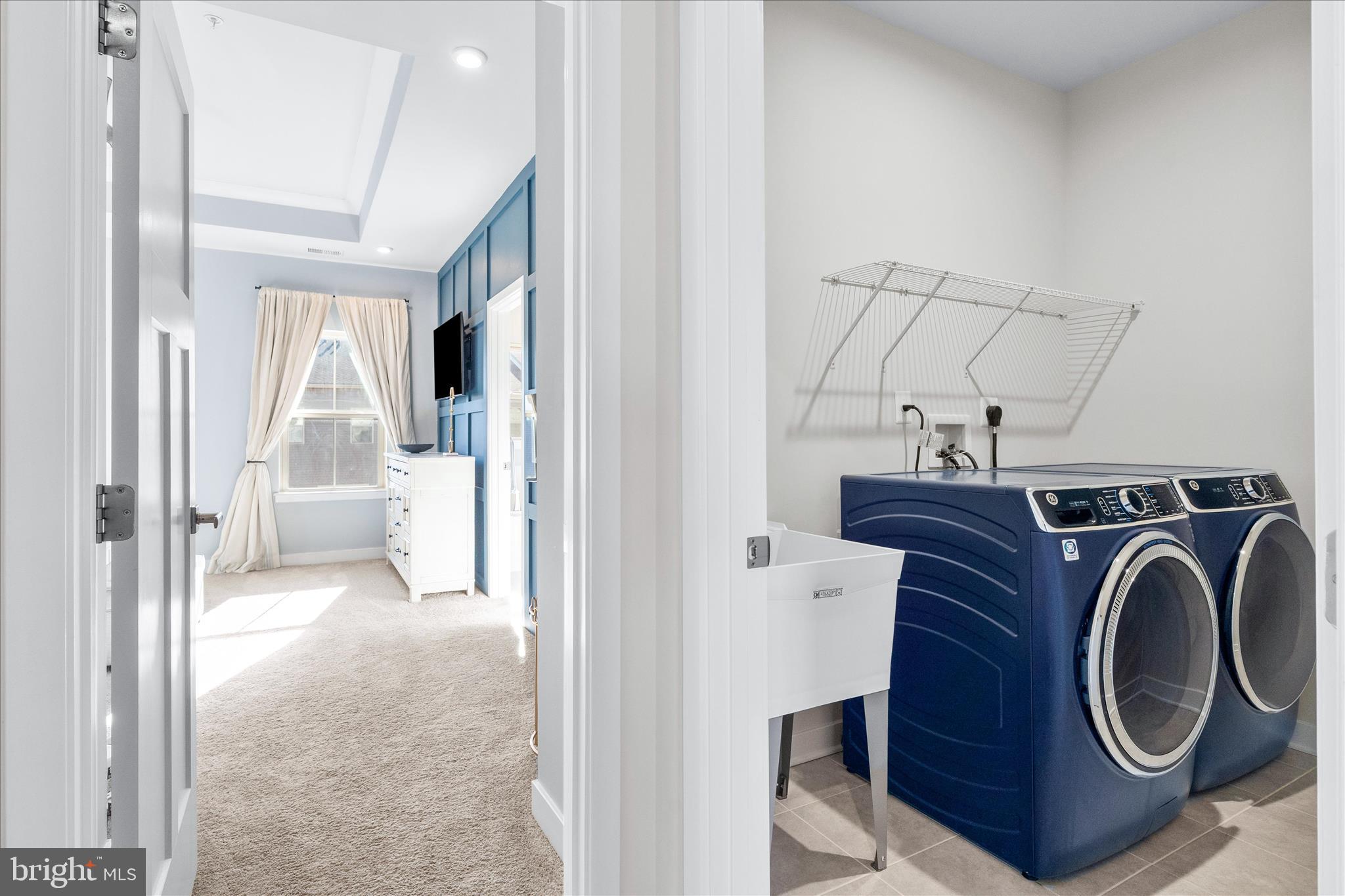 10327 Quillback Street New Market, MD 21774 - Photo 19 of 50 a view of a hallway with washer and dryer