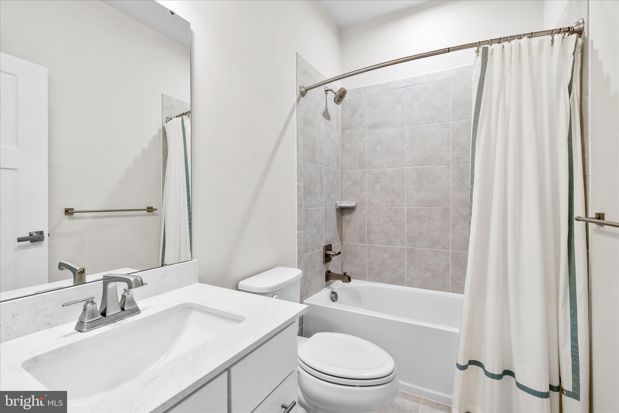 10327 Quillback Street New Market, MD 21774 - Photo 30 of 50 a bathroom with a sink toilet and shower