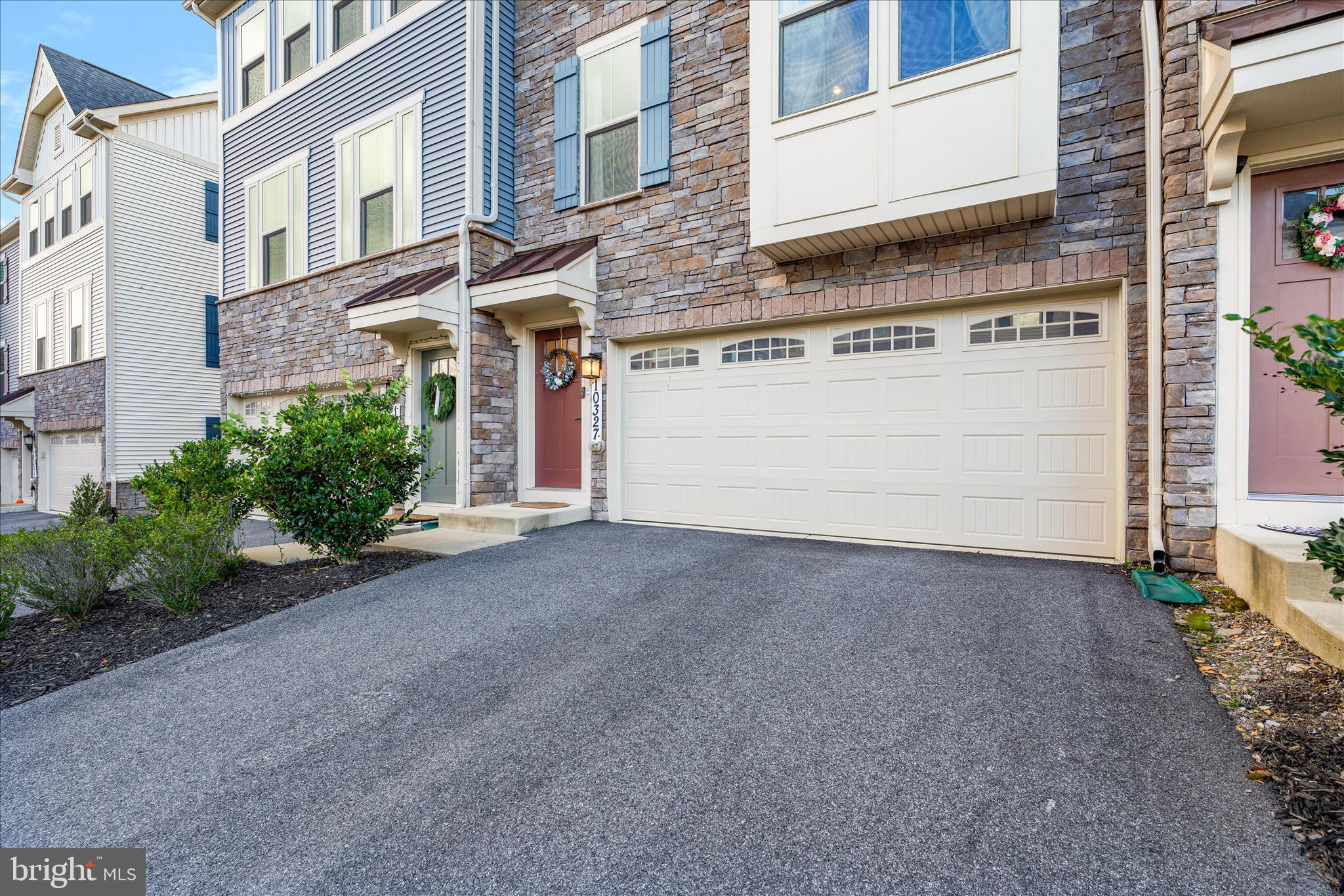10327 Quillback Street New Market, MD 21774 - Photo 4 of 50 a view of a building with a street