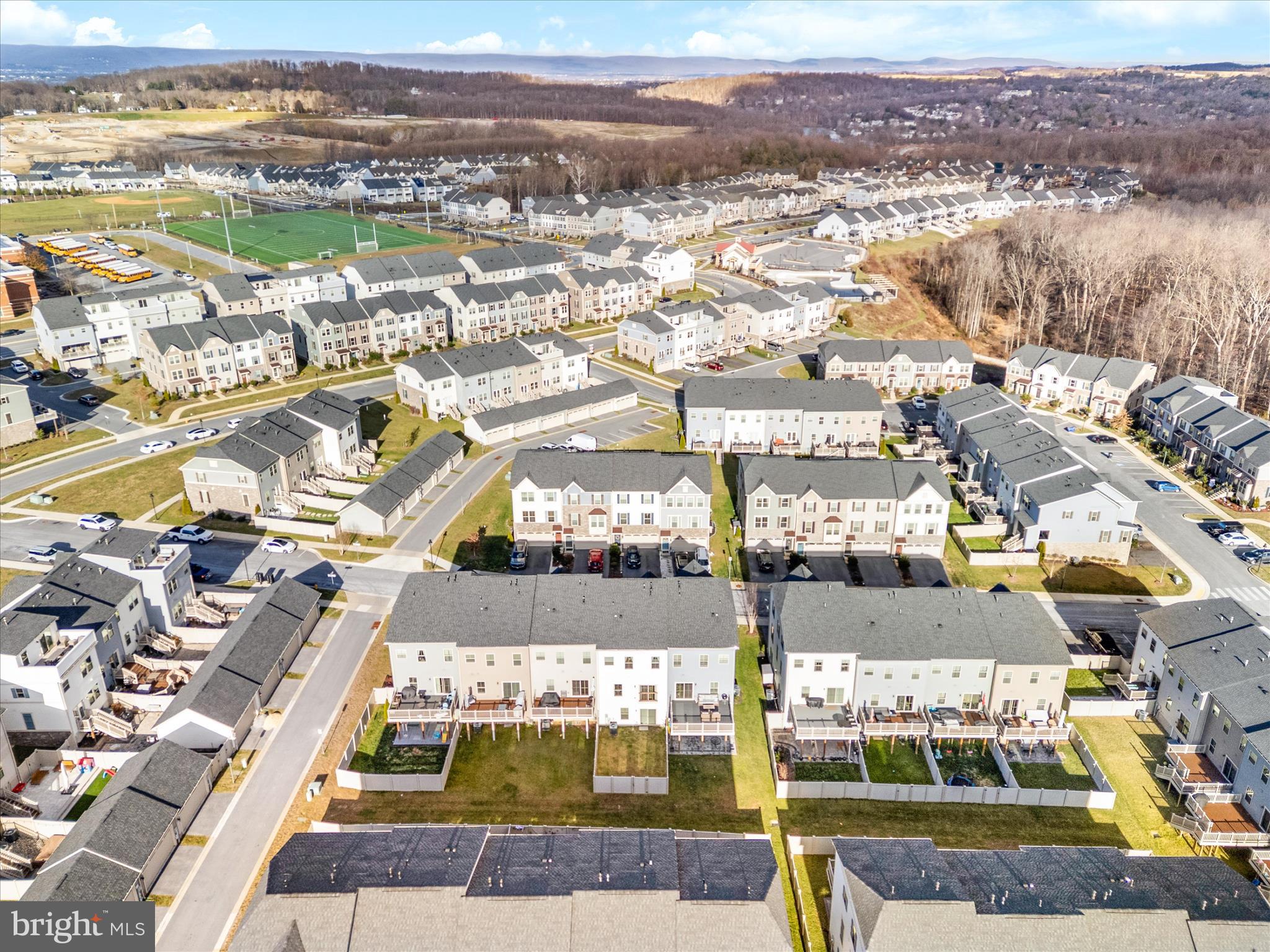 10327 Quillback Street New Market, MD 21774 - Photo 41 of 50 an aerial view of residential houses with outdoor space