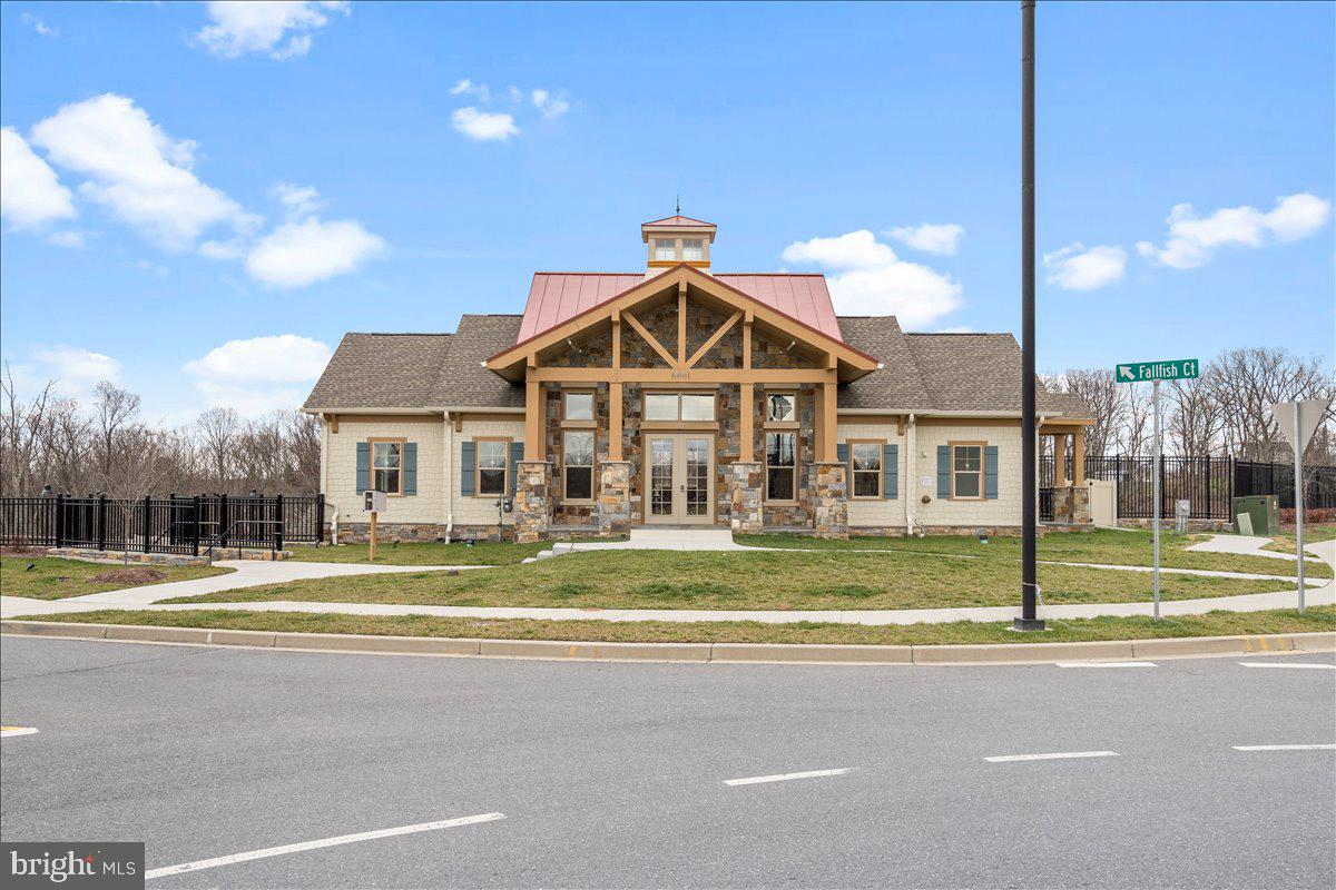 10327 Quillback Street New Market, MD 21774 - Photo 46 of 50 a view of a house with a big yard and large trees
