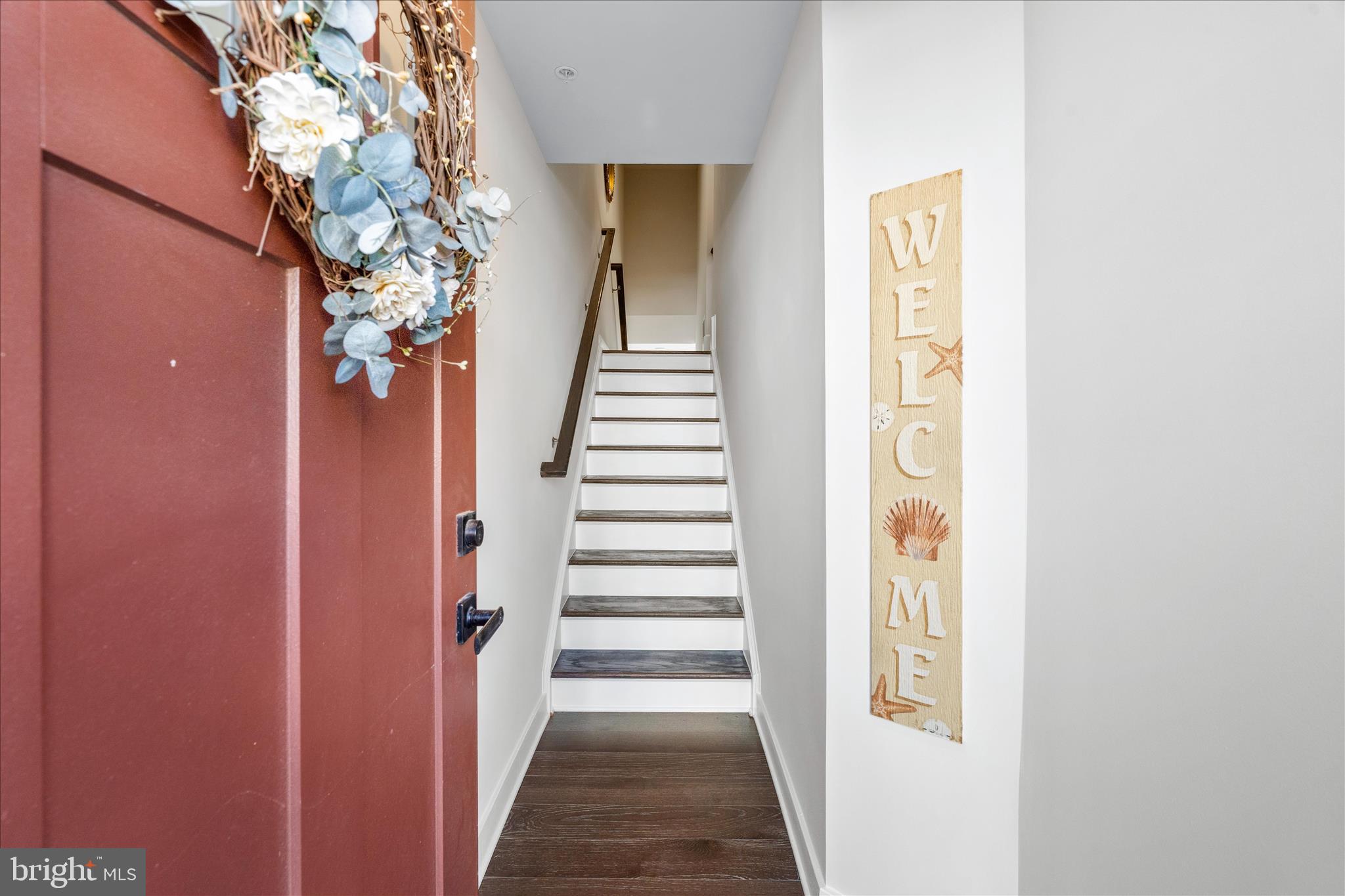 10327 Quillback Street New Market, MD 21774 - Photo 5 of 50 a view of a hallway with wooden floor and entryway