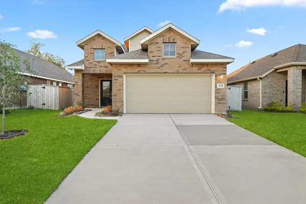 a front view of house with yard